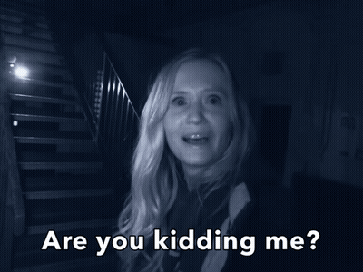 A Black And White Photo Of A Woman With The Words " Are You Kidding Me " Below Her GIF