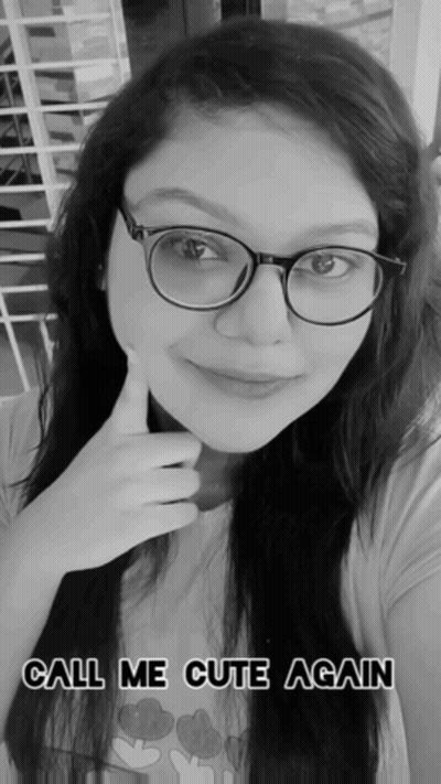 A Black And White Photo Of A Woman With The Words Call Me Cute Again On The Bottom GIF