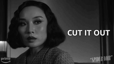 A Black And White Photo Of A Woman With The Words " Cut It Out " Above Her GIF