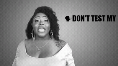 A Black And White Photo Of A Woman With The Words " Do N't Test My " Behind Her GIF