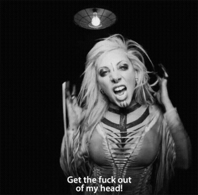 A Black And White Photo Of A Woman With The Words " Get The Fuck Out Of My Head " GIF