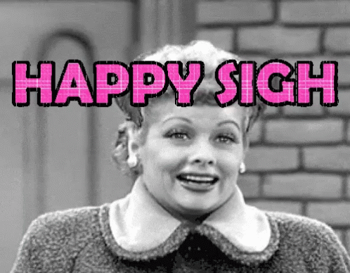 A Black And White Photo Of A Woman With The Words Happy Sigh Written On It GIF