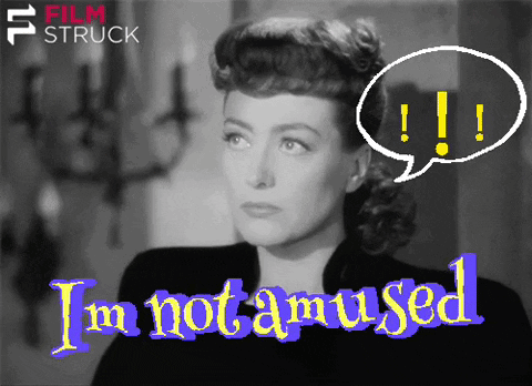A Black And White Photo Of A Woman With The Words I 'M Not Amused Above Her GIF