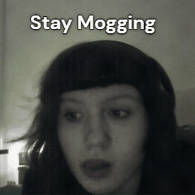 A Black And White Photo Of A Woman With The Words Stay Mogging Below Her GIF
