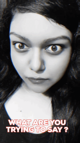 A Black And White Photo Of A Woman With The Words " What Are You Trying To Say " Above Her GIF