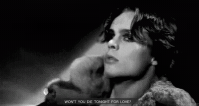 A Black And White Photo Of A Woman With The Words `` Won T You Die Tonight For Love '' . GIF