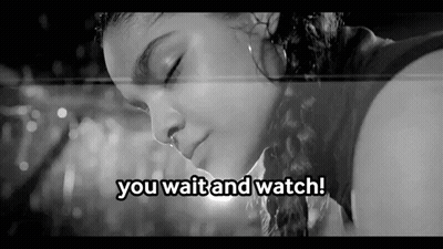 A Black And White Photo Of A Woman With The Words You Wait And Watch Below Her . GIF