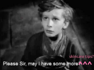 A Black And White Photo Of A Young Boy Asking For Skincare Tips GIF