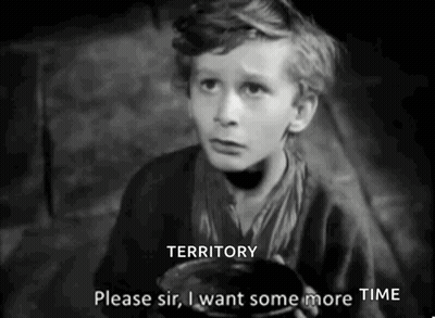 A Black And White Photo Of A Young Boy Asking For Some More Time . GIF