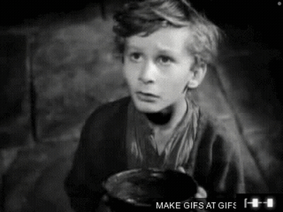 A Black And White Photo Of A Young Boy Holding A Cup With The Caption Make Gifs At Gifs GIF