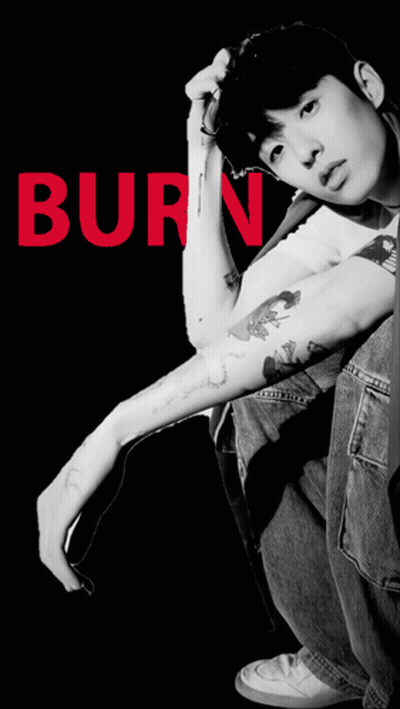 A Black And White Photo Of A Young Man With The Word Baby Written In Red GIF