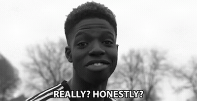 A Black And White Photo Of A Young Man With The Words `` Really ? Honestly ? '' Written Next To Him . GIF