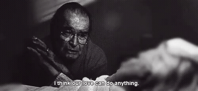 A Black And White Photo Of An Elderly Man With Glasses And The Words I Think Our Love Can Do Anything GIF