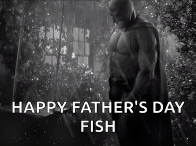 A Black And White Photo Of Batman With The Words `` Happy Father 'S Day Fish '' Written Below Him . GIF