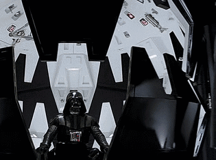 A Black And White Photo Of Darth Vader Sitting In A Throne GIF