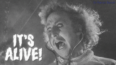 A Black And White Photo Of Frankenstein With The Words It 'S Alive On The Bottom GIF