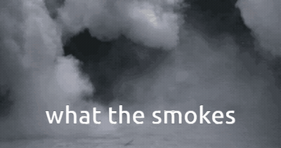 A Black And White Photo Of Smoke With The Words What The Smoke Says GIF
