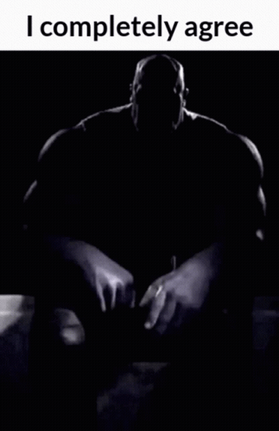 A Black And White Photo Of Thanos With The Words I Completely Agree GIF
