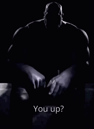 A Black And White Photo Of Thanos With The Words `` You Up '' Written On It . GIF