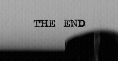 A Black And White Photo Of The End Written On A Piece Of Paper GIF