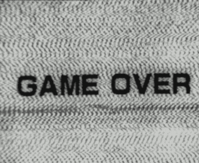 A Black And White Photo Of The Words Game Over On A Television Screen . GIF