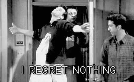 A Black And White Photo Of Three Men Standing Next To Each Other In A Room . GIF