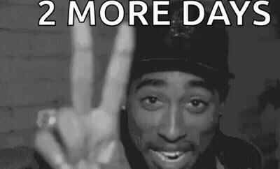 A Black And White Photo Of Tupac Shakur Making A Peace Sign . GIF
