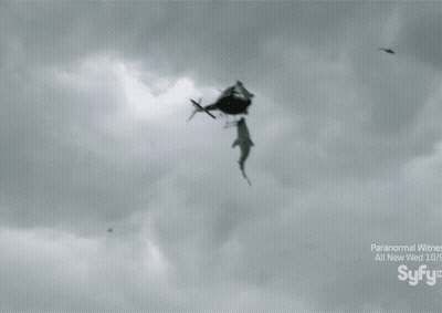 A Black And White Photo Of Two Helicopters In The Sky With Syfy Written On The Bottom Right GIF