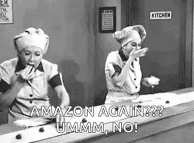 A Black And White Photo Of Two Women In Chef 'S Hats Standing Next To Each Other In A Kitchen . GIF
