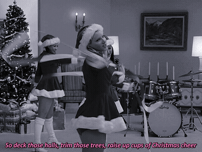 A Black And White Photo With The Words So Deck Those Halls Trim Those Trees Raise Up Cups Of Christmas Cheer At The Top GIF