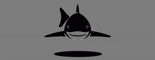 A Black And White Shark Is Smiling And Looking Out Of A Hole In The Water . GIF