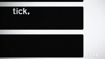 A Black And White Sign That Says Tick Tick Boom On It GIF