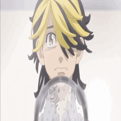 A Black And Yellow Anime Character With A Tattoo On His Chest Looks At Himself In A Mirror GIF