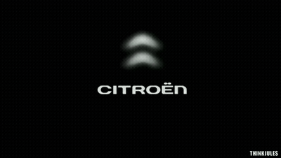 A Black Background With A Citroen Logo GIF