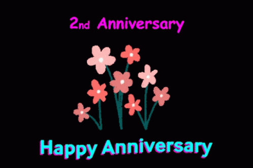A Black Background With Pink Flowers And The Words Happy Anniversary GIF