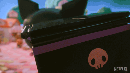 A Black Box With A Skull On It That Says Netflix On The Bottom GIF