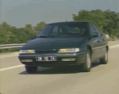 A Black Car With A License Plate That Says Dx 15 24 GIF