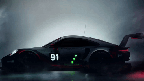 A Black Car With The Number 91 On It GIF