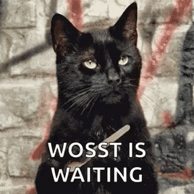 A Black Cat Is Holding A Nail Polisher In Its Paws . GIF