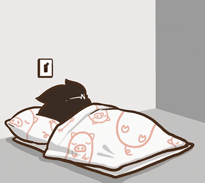 A Black Cat Is Laying On A Bed With A Blanket With Pigs On It GIF