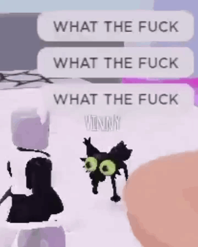 A Black Cat With Green Eyes Is Standing Next To A Person In A Room . GIF