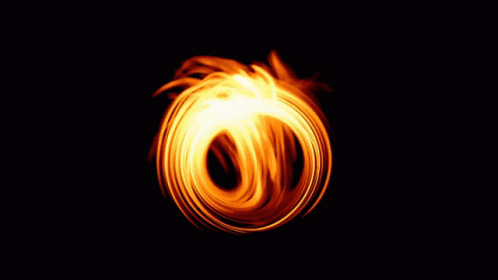 A Black Hole In The Middle Of A Swirl Of Light GIF