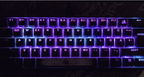 A Black Keyboard With Purple Letters And Numbers GIF