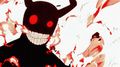 A Black Monster With Red Eyes And Horns Is Smiling GIF