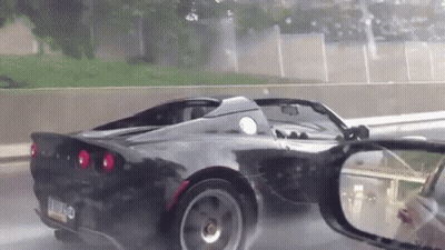 A Black Sports Car With A License Plate That Says L.j.o. On It GIF