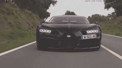 A Black Sports Car With A License Plate That Says W-022 Ja GIF