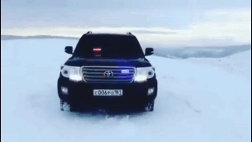 A Black Toyota Suv With A License Plate That Reads C006po 16 1 GIF