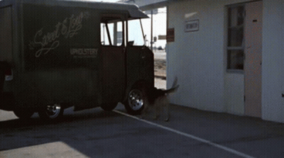 A Black Van That Says Sweet Joy Upholstery On It GIF