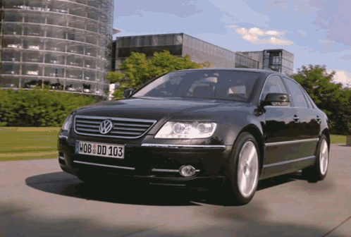 A Black Volkswagen With A License Plate That Says Ho8 Dd 103 GIF