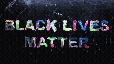 A Blackboard With The Words " Black Lives Matter " Painted In Different Colors GIF